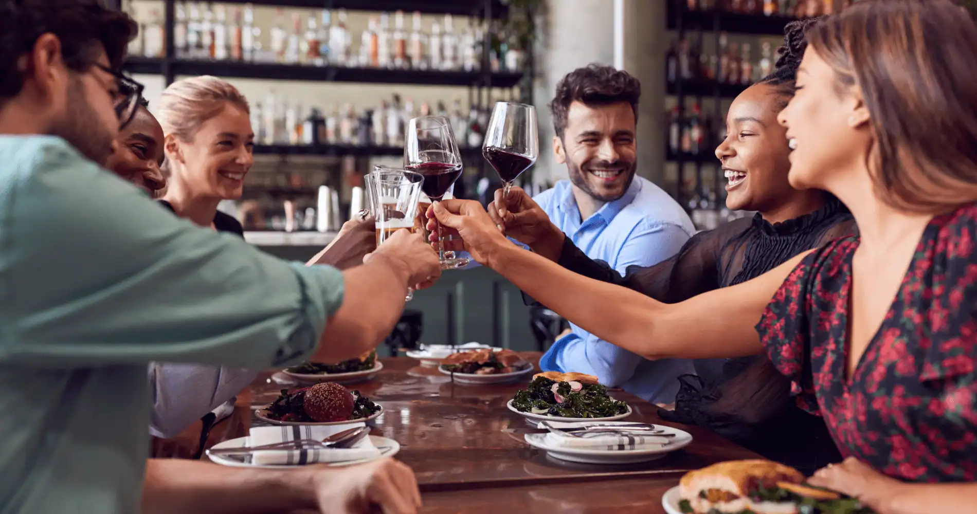 Group of friends celebrating in a restaurant